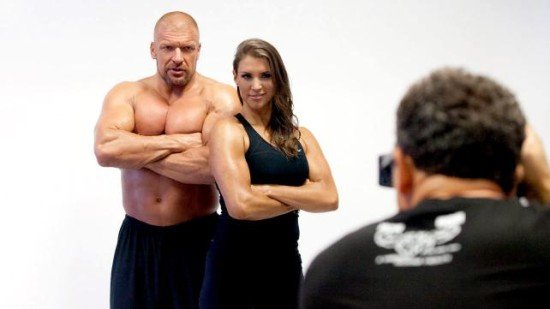 Triple H A& His Wife Posses For Fitness Cover Photo hq image